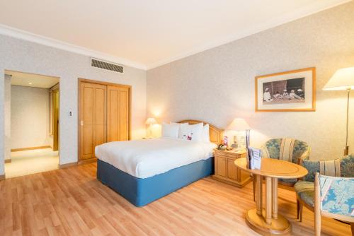 Imagen de la habitación del Hotel Millennium Downtown. Foto 20