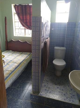 Imagen de la habitación del Hotel Millennium Guest House. Foto 7