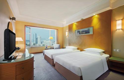 Imagen de la habitación del Hotel Millennium Harbourview Xiamen. Foto 5