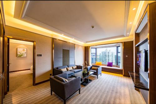 Imagen de la habitación del Hotel Millennium Harbourview Xiamen. Foto 6
