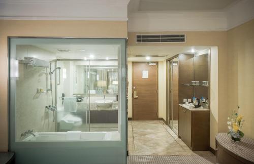 Imagen de la habitación del Hotel Millennium Harbourview Xiamen. Foto 8