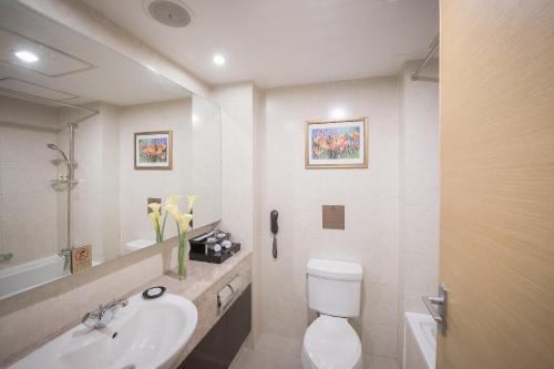 Imagen de la habitación del Hotel Millennium Harbourview Xiamen. Foto 9