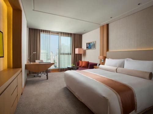 Imagen de la habitación del Hotel Millennium Hotel Taichung. Foto 9