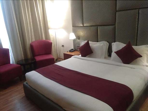 Imagen de la habitación del Hotel Millennium Inn, Allahabad. Foto 2