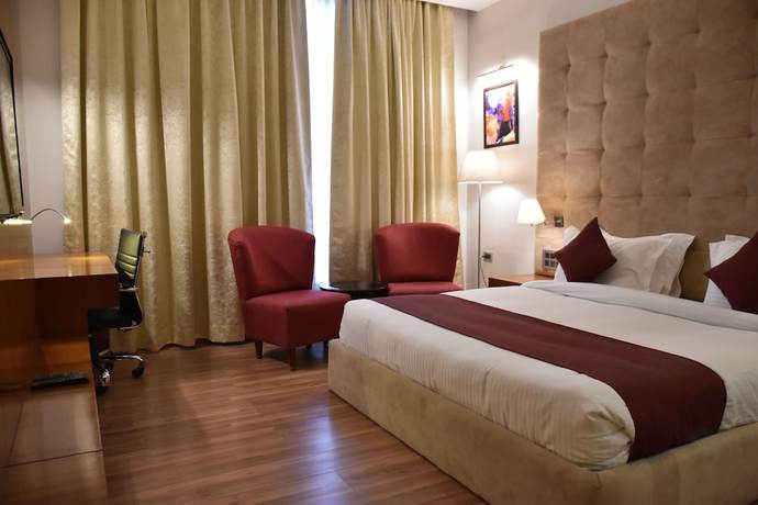 Imagen de la habitación del Hotel Millennium Inn, Allahabad. Foto 4