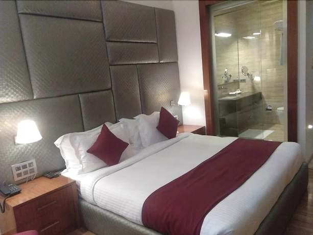 Imagen de la habitación del Hotel Millennium Inn, Allahabad. Foto 9