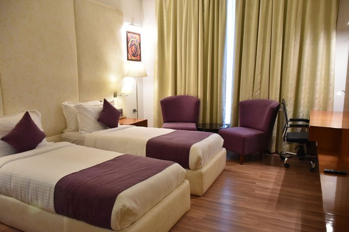 Imagen de la habitación del Hotel Millennium Inn, Allahabad. Foto 10