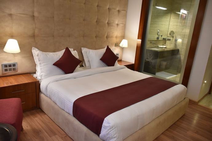 Imagen de la habitación del Hotel Millennium Inn, Allahabad. Foto 11