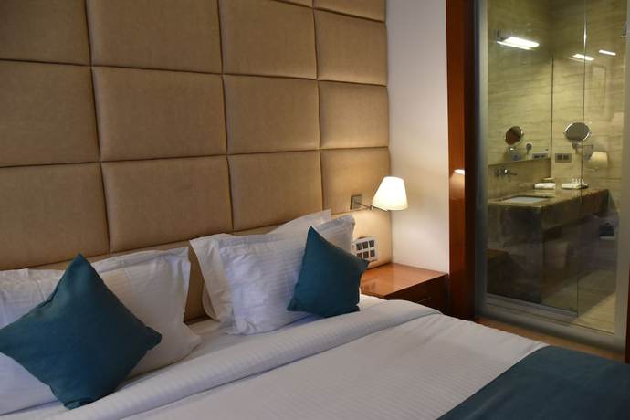 Imagen de la habitación del Hotel Millennium Inn, Allahabad. Foto 13