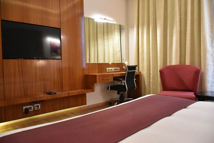 Imagen de la habitación del Hotel Millennium Inn, Allahabad. Foto 15