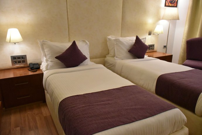 Imagen de la habitación del Hotel Millennium Inn, Allahabad. Foto 16