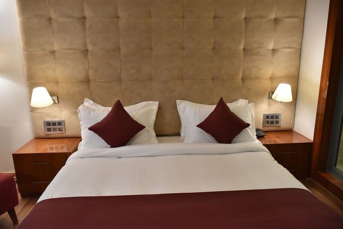 Imagen de la habitación del Hotel Millennium Inn, Allahabad. Foto 18