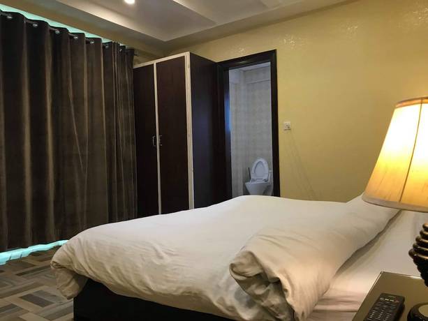 Imagen de la habitación del Hotel Millennium Inn Naran. Foto 11