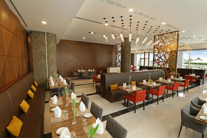 Imagen del bar/restaurante del Hotel Millennium Madinah Airport. Foto 3