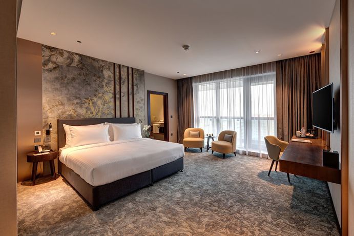 Imagen de la habitación del Hotel Millennium Place Barsha Heights. Foto 16