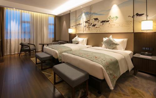 Imagen de la habitación del Hotel Millennium Resort Wuyishan. Foto 2
