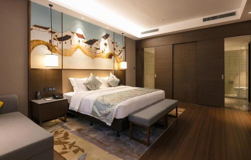 Imagen de la habitación del Hotel Millennium Resort Wuyishan. Foto 8