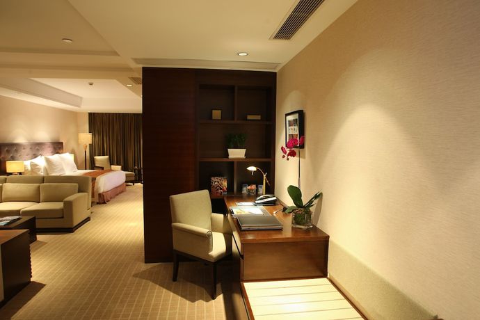 Imagen de la habitación del Hotel Millennium Wuxi. Foto 2