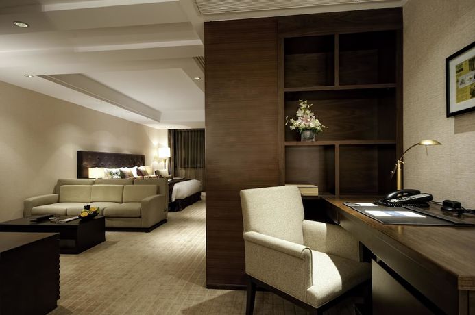 Imagen de la habitación del Hotel Millennium Wuxi. Foto 3