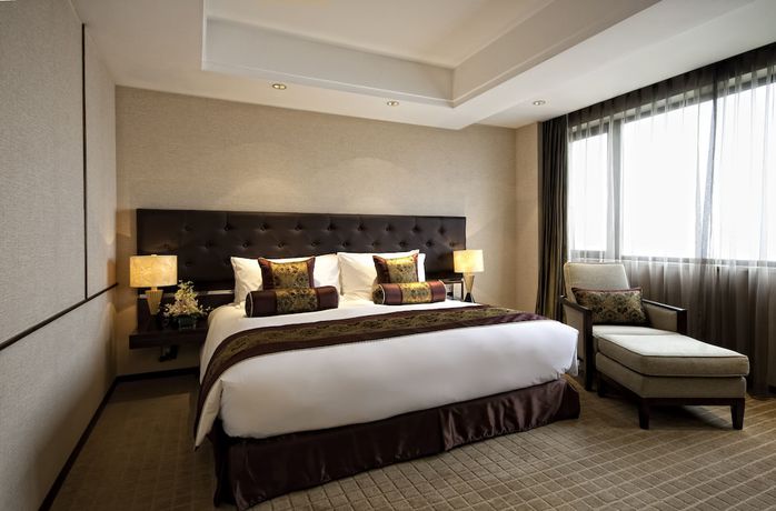 Imagen de la habitación del Hotel Millennium Wuxi. Foto 4