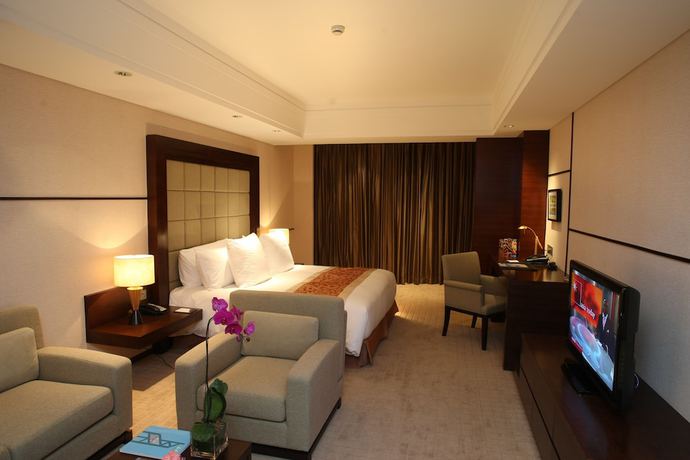 Imagen de la habitación del Hotel Millennium Wuxi. Foto 9