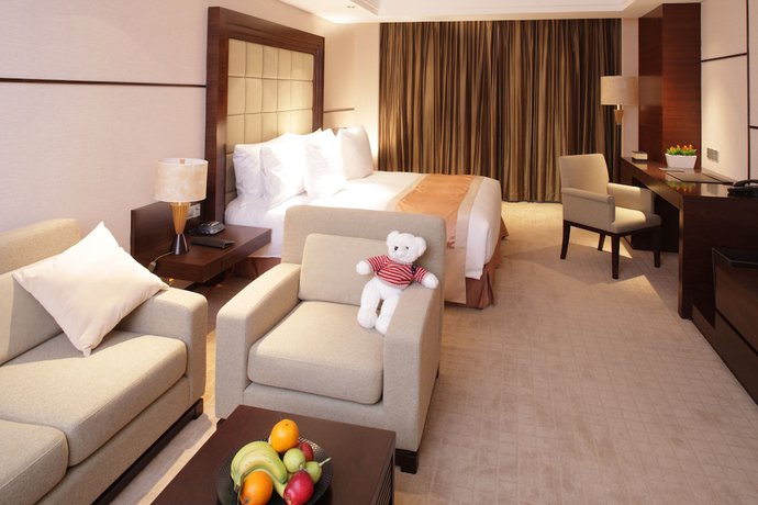 Imagen de la habitación del Hotel Millennium Wuxi. Foto 10
