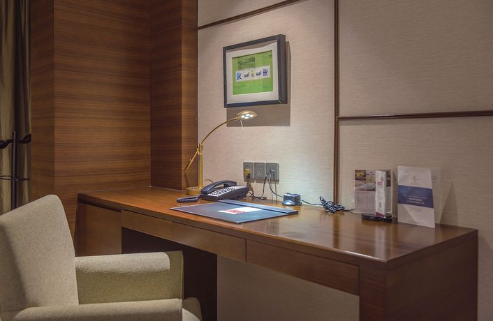 Imagen de la habitación del Hotel Millennium Wuxi. Foto 11