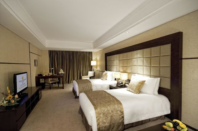 Imagen de la habitación del Hotel Millennium Wuxi. Foto 12