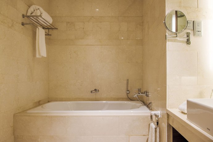 Imagen de la habitación del Hotel Millennium Wuxi. Foto 15