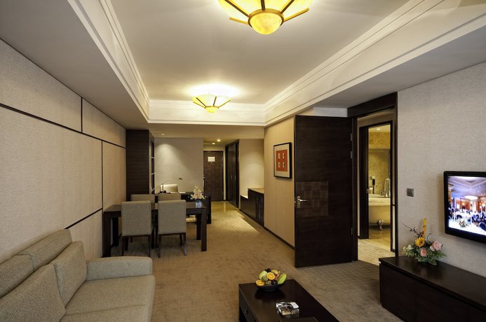 Imagen de la habitación del Hotel Millennium Wuxi. Foto 16