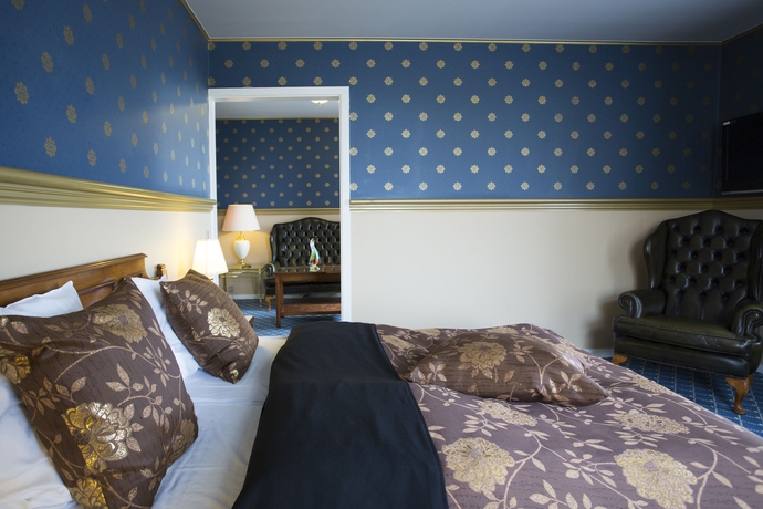 Imagen de la habitación del Hotel Milling Plaza. Foto 8