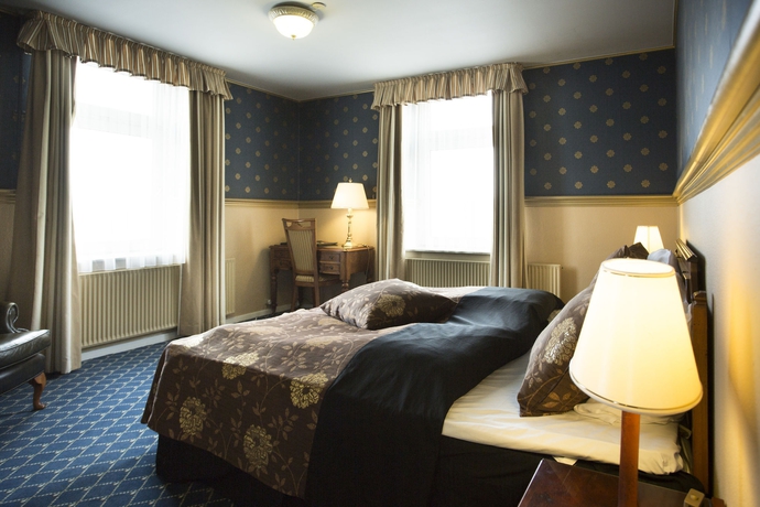 Imagen de la habitación del Hotel Milling Plaza. Foto 13