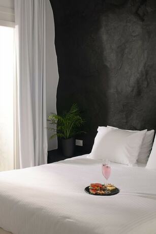 Imagen de la habitación del Hotel Million Stars Mykonos. Foto 17