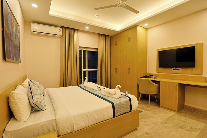 Imagen de la habitación del Hotel Millora Cyber Suites. Foto 6