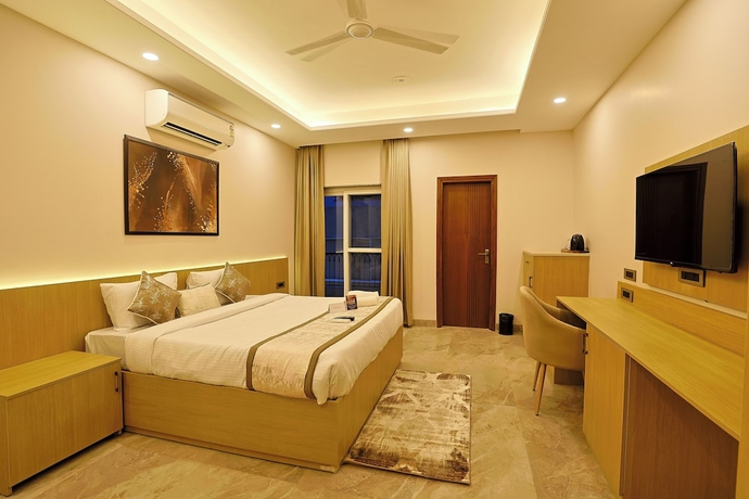 Imagen de la habitación del Hotel Millora Cyber Suites. Foto 8