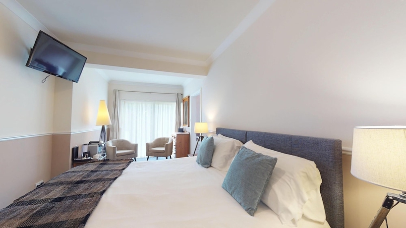 Imagen de la habitación del Hotel Milltown House. Foto 9