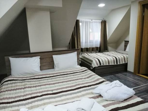 Imagen de la habitación del Hotel Milmari. Foto 19