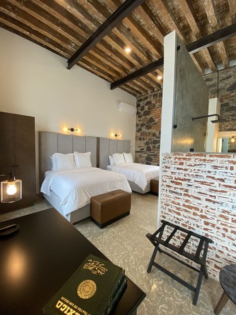 Imagen de la habitación del Hotel Milo Collection. Foto 17