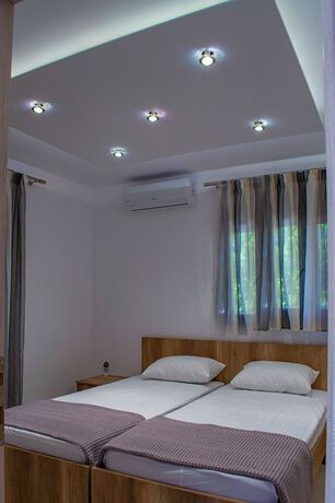 Imagen de la habitación del Hotel Milonas House Apartments. Foto 18