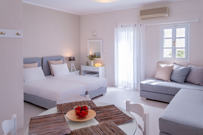 Imagen de la habitación del Hotel Milos Bay Suites. Foto 11