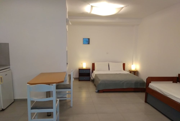 Imagen de la habitación del Hotel Milos Bay Suites. Foto 14