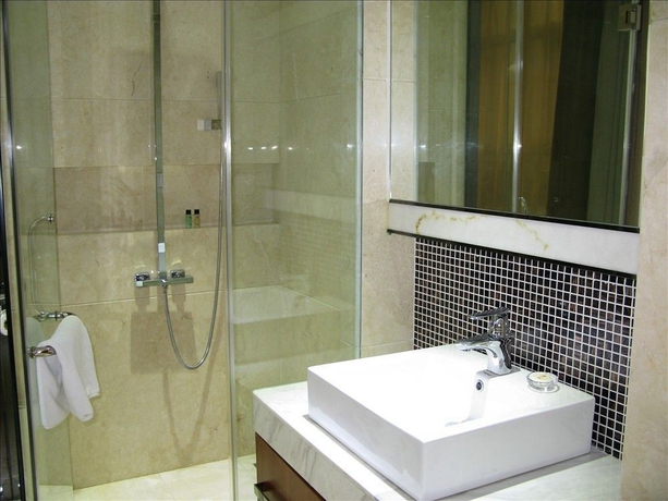 Imagen de la habitación del Hotel Milu Hotel. Foto 3