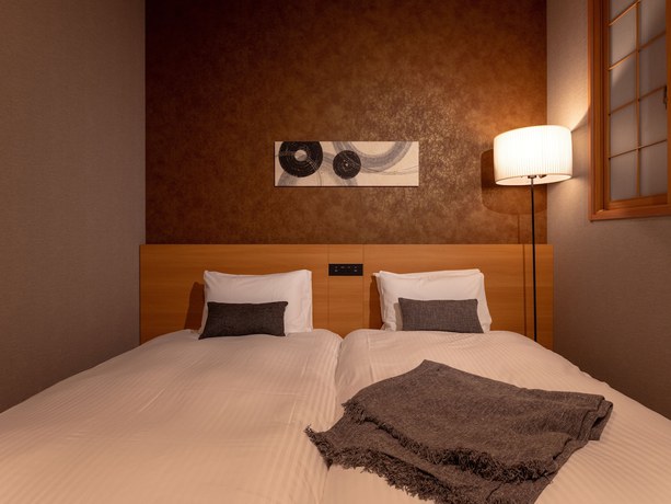 Imagen de la habitación del Hotel Mimaru Suites Tokyo Asakusa. Foto 15