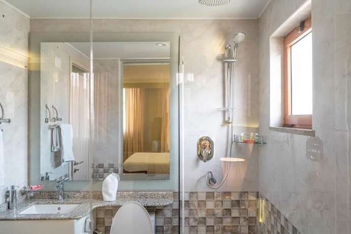 Imagen de la habitación del Hotel Mimi\'s Boutique. Foto 7