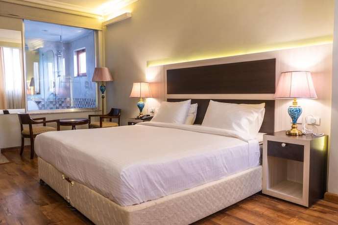 Imagen de la habitación del Hotel Mimi\'s Boutique. Foto 11