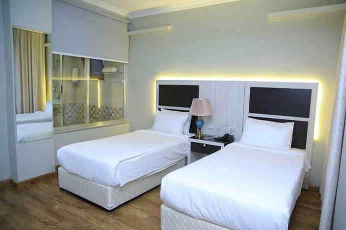 Imagen de la habitación del Hotel Mimi\'s Boutique. Foto 15