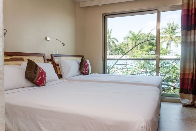 Imagen de la habitación del Hotel Mimosa Flat by Realty Group. Foto 5