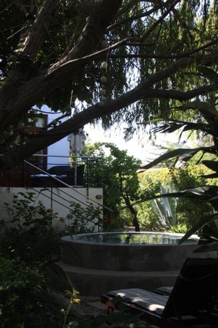 Imagen de la habitación del Hotel Mimosa Lodge. Foto 8