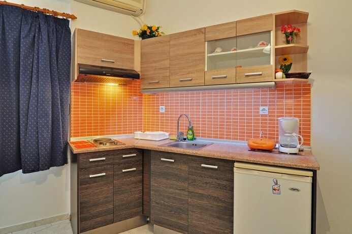 Imagen de la habitación del Hotel Mimoza Rooms. Foto 20