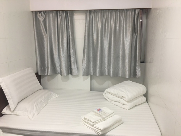 Imagen de la habitación del Hotel Min Hing house. Foto 9